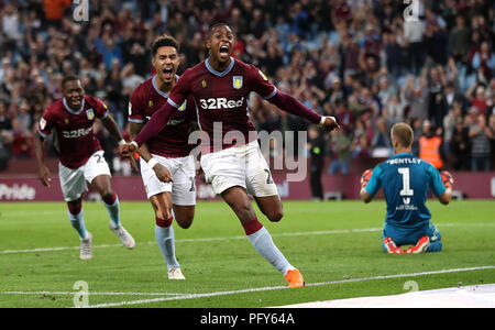 Aston Villa Jonathan Kodjia (Mitte) feiert das zweite Ziel seiner Seite des Spiels als Brentford Torwart Daniel Bentley (rechts) sieht während der Sky Bet Championship Match in der Villa Park, Birmingham niedergeschlagen zählen. Stockfoto