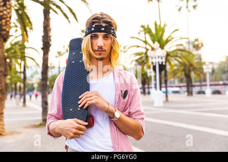 Porträt von Ernst Skateboarder Stockfoto