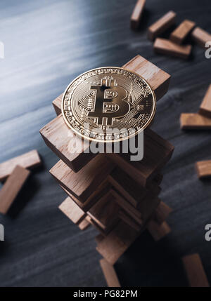 Bitcoin auf dem hölzernen Bausteine Tower. Konzept für bitcoin Risiko oder bitcoin Strategie Stockfoto