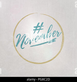 #Hashtag November in Blau auf grauem Hintergrund als Vorlage in handschriftlichen Stil geschrieben Stockfoto