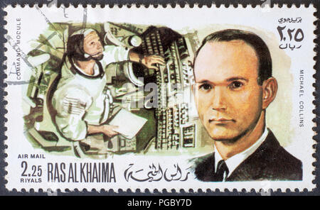 RAS AL KHAIMA - ca. 1969: ein Stempel gedruckt von Ras Al Khaima zeigt Michael Collins Astronaut, ca. 1969 Stockfoto