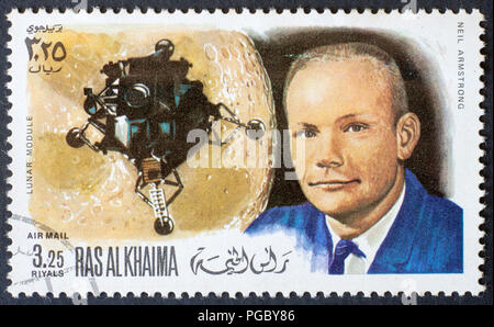 RAS AL KHAIMA - ca. 1969: ein Stempel gedruckt von Ras Al Khaima zeigt Neil Armstrong - der erste Mensch auf dem Mond, ca. 1969. Stockfoto