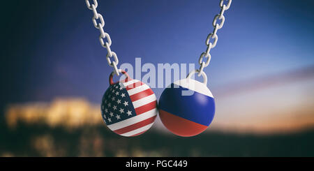 Uns von Amerika und Russland Beziehungen. USA und Russische Flaggen wrecking Bälle schwingen auf blauen bewölkten Himmel Hintergrund. 3D-Darstellung Stockfoto