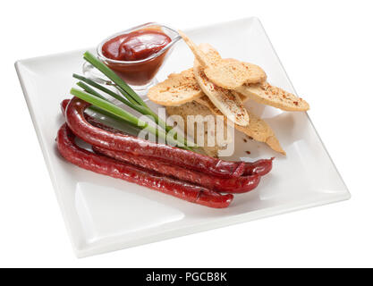 Pommes und Würstchen. Stockfoto