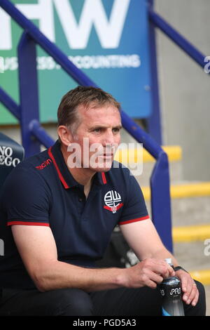 Bolton, Lancashire, UK. 25 August, 2018. Bolton Wanderers Manager Phil Parkinson im dugout vor der EFL Meisterschaftspiel Bolton Wanderers v Sheffield United. Foto: Simon Newbury/Alamy leben Nachrichten Stockfoto