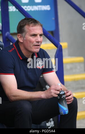 Bolton, Lancashire, UK. 25 August, 2018. Bolton Wanderers Manager Phil Parkinson im dugout vor der EFL Meisterschaftspiel Bolton Wanderers v Sheffield United. Foto: Simon Newbury/Alamy leben Nachrichten Stockfoto