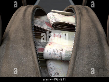 Ein schmuggel Konzept, das eine offene braun Leder Reisetasche enthüllt Bündel illegaler gerollt Indian Rupee Notizen - 3D-Rendering Stockfoto