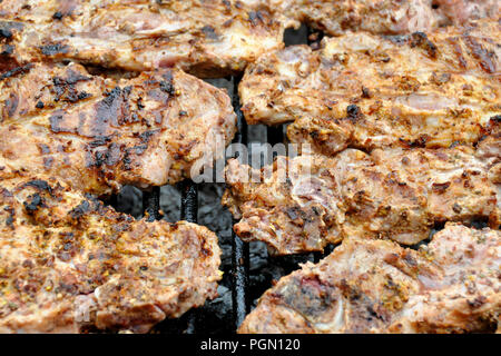 Saftiges Steak auf den Grill. die Produktion von Lebensmitteln Stockfoto