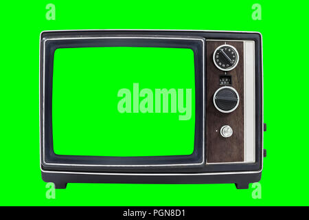 Kleine vintage tragbare Fernseher mit Chroma Green Screen und Hintergrund. Stockfoto