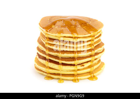 Pfannkuchen mit Honig auf weißem Hintergrund closeup isoliert Stapel Stockfoto