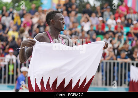 Palembang, Indonesien. 28 Aug, 2018. Cherif Younousse Samba von Katar feiert nach dem Gewinn der Männer Beachvolleyball Finale gegen Indonesien am 18. asiatischen Spiele in Palembang, Indonesien, Aug 28., 2018. Katar behauptete den Titel. Credit: Cheng Min/Xinhua/Alamy leben Nachrichten Stockfoto