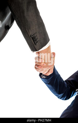 Konzeptionelle Geschäftsleute in Grau und Geschäftsfrau im blauen Anzug schütteln die Hände. Auf weissem Hintergrund. Stockfoto