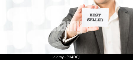 Erfolgreiche Händler zeigen ein Bestseller, Business Card, seine Dienstleistungen zu fördern. Stockfoto