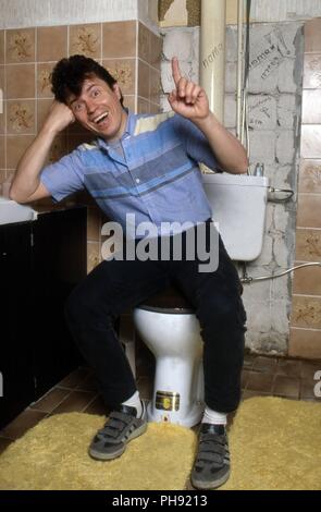 Günther Sigl, der Sänger der 'Spider Murphy Gang', bayerische Band in Parsdorf, Deutschland 1985. Sänger Günther Sigl der Deutschen bayerische Band 'Spider Mur Stockfoto