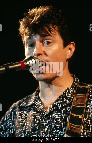 Günther Sigl, der Sänger der 'Spider Murphy Gang', bayerische Band bei einem Konzert in Memmingen, Deutschland 1985. Sänger Günther Sigl der Deutschen Bavari Stockfoto