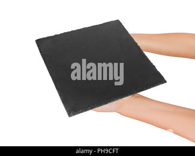 Frau Hand leeren Platz schiefer Platter. perspektivische Ansicht Vorlage für Ihr Design. auf weißem Hintergrund. Stockfoto