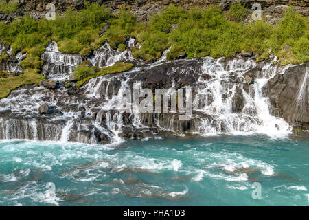 Hraunfossar Wasserfälle - Western Island Stockfoto