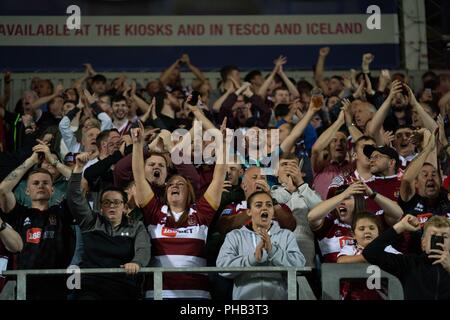 Merseyside, UK. 31. August 2018. Wigan Fans ihre Vereine feiern gewinnen, 31. August 2018, total Gottlosen Stadion, Merseyside, England; besser Super League Rugby, Super 8 s-3, St Helens v Wigan Warriors; Quelle: News Images/Alamy leben Nachrichten Stockfoto