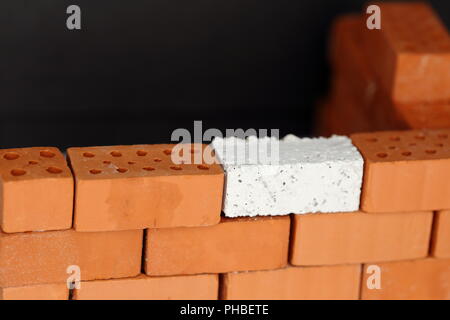 Ein Stein in der Mauer Stockfoto