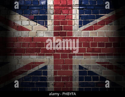 Britische Flagge auf einem gemauerten Wand Hintergrund Stockfoto