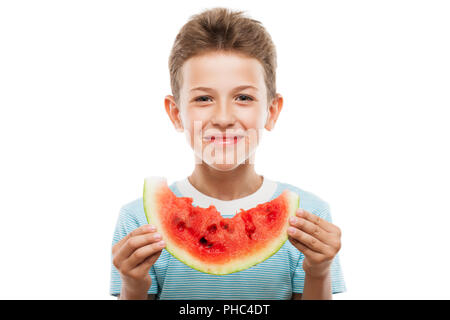 Stattliche lächelndes Kind Junge mit roten Wassermelone Obst Slice Stockfoto