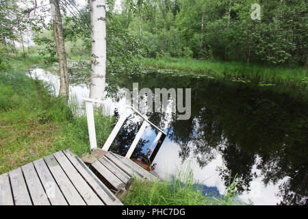 Teich zum Schwimmen und im Wasser Rampen Stockfoto