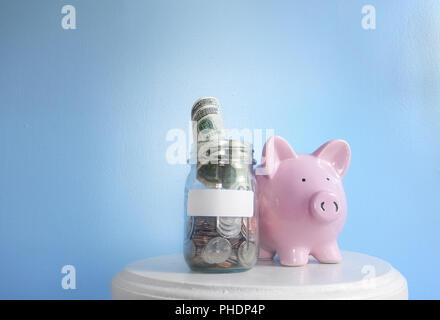 Sparschwein Münze Glas Tag Stockfoto