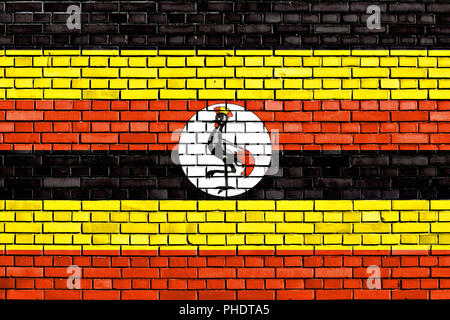 Flagge Ugandas auf Mauer gemalt Stockfoto