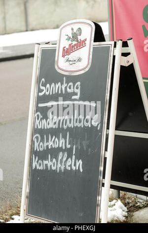 Werbung, die sich an einem home-style Restaurant im Zentrum von Deutschland Stockfoto