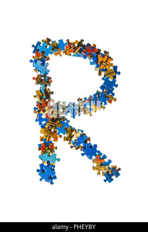 Buchstabe R aus Puzzleteile Stockfoto