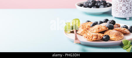 Niederländische mini Pfannkuchen Stockfoto