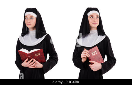 Junge Nonne mit Bibel isoliert auf weiss Stockfoto