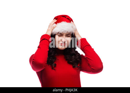 Bild von traurig, zornig junge Frau in Weihnachten hut mit Kopfschmerzen, auf weißem Hintergrund. Stockfoto