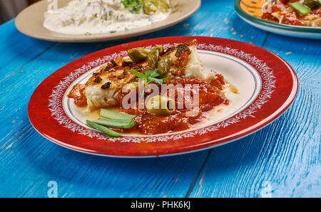 Salz Kabeljau in Tomatensauce Stockfoto