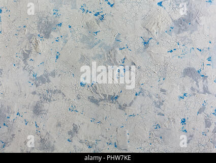 Alte konkreten Hintergrund mit Rissen und blaue Flecken. Stockfoto