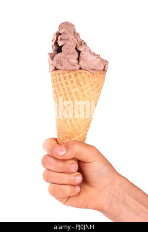 Gebissen Schokolade Eis in der Waffel Horn in der Hand isoliert auf einem weißen Hintergrund. Stockfoto