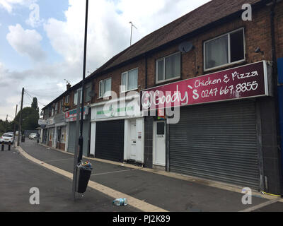 Die Goody Huhn und Pizza Shop in der Nähe von Coventry, wo ein 17-jähriger Junge in Herzstillstand ging nach TASERED von der Polizei nach einem Unordnung und wer bleibt im Krankenhaus in eine ernste, aber stabilen Zustand. Stockfoto