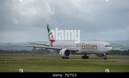 Emirates Airlines Boeing 777 Flug nach Dubai fährt der Internationale Flughafen Glasgow, Renfrewshire, Schottland - 14. Juni 2018 Stockfoto