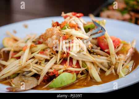 Papaya Somtum lecker Thai Essen. Stockfoto