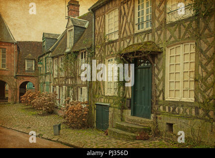 Alte Häuser im mittelalterlichen Dorf. Valence, Frankreich. Hinzugefügt Papier Textur. Stockfoto