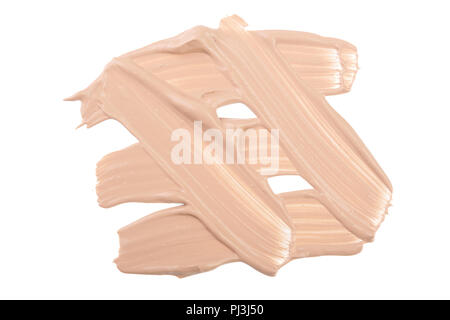 Beige Liquid Foundation Make-up auf weißem Hintergrund Stockfoto