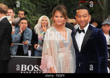 London, UK, 5. Sep 2018. Chrissy Teigen und John Legend nehmen an der GQ Männer des Jahres Auszeichnungen in der Tate Modern Stockfoto