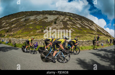 Whinlatter, Cumbria, Großbritannien. 6. September 2018. Team Michelton Scott Speed im Rennen, als sie die letzten Kilometer der Etappe Ansatz. Credit: Stephen Fleming/Alamy leben Nachrichten Stockfoto