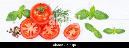 Tomaten Tomaten Gemüse mit Basilikum von oben banner Holzbrett Holz Stockfoto