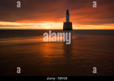 Rattray Head Lighthouse in Sunrise Licht, Ostküste Schottlands Stockfoto