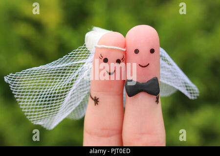 Finger Kunst des glücklichen Paares zu heiraten. Konzept der Trauung. Stockfoto