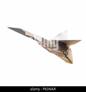 Origami Flugzeug von Banknoten Stockfoto