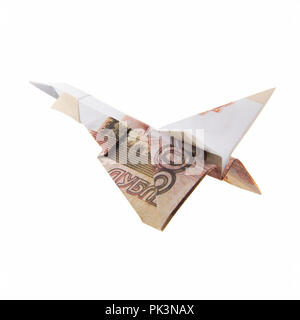 Origami Flugzeug von Banknoten Stockfoto