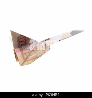 Origami Flugzeug von Banknoten Stockfoto