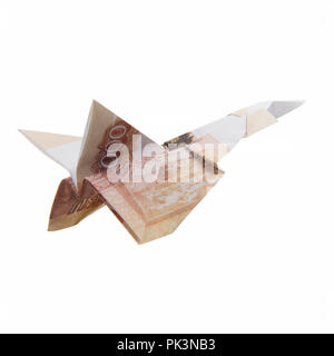 Origami Flugzeug von Banknoten Stockfoto